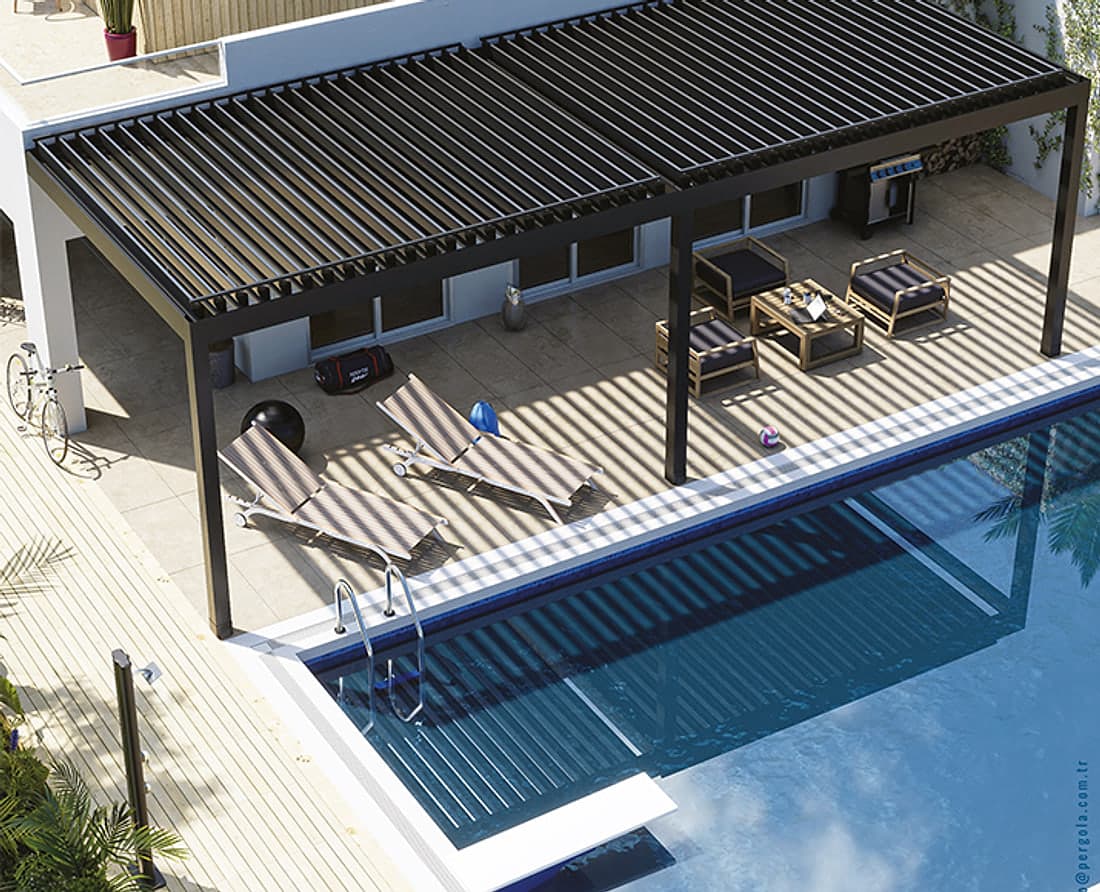 SkyLounge bioclimatic pergola over a poolside terrace with sun loungers, lounge chairs and striped shade, seen from above